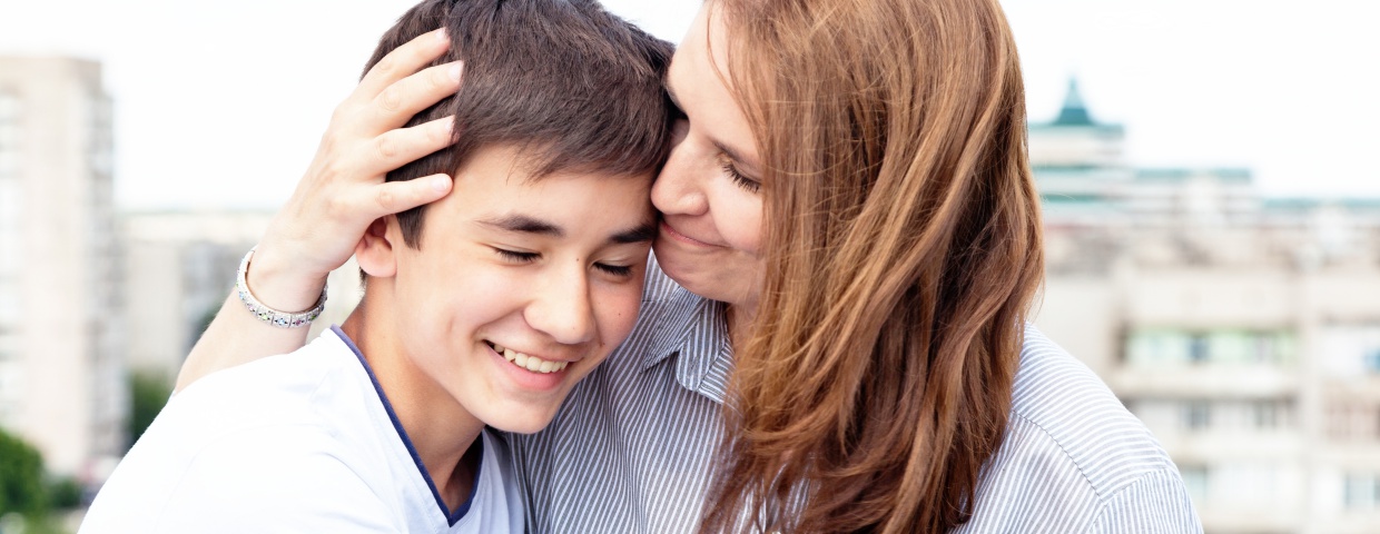 mother and son happy about online school