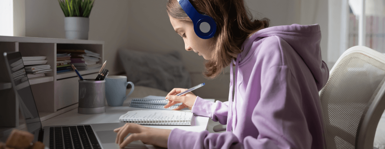 female middle school online student studying for class
